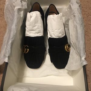 Authentic Gucci shoes .